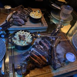 Freddy’s Chophouse signature dishes Skirt SteakPork Belly ToastCoconut Shrimp